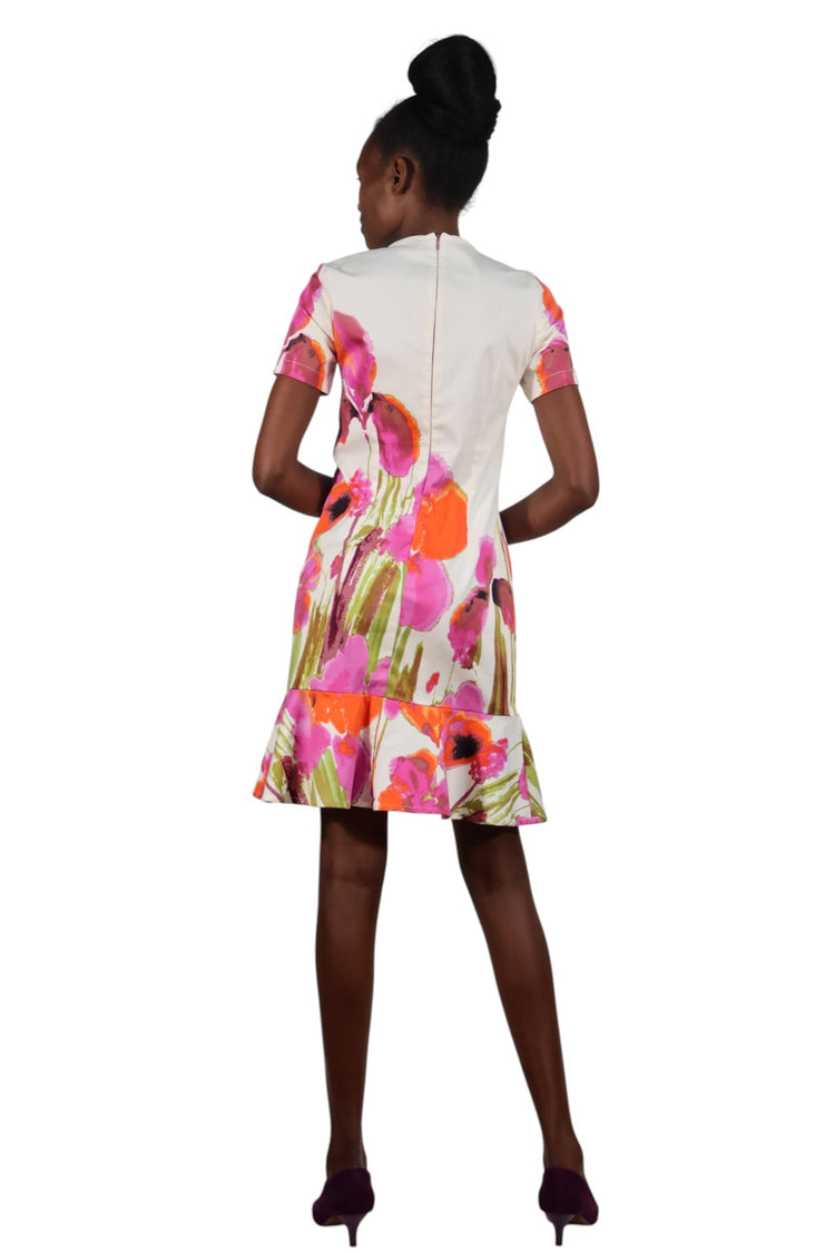 Off white floral round neck dress with a peplum