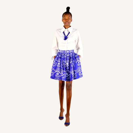 Blue eye print skirt with gathers, pockets and back zip