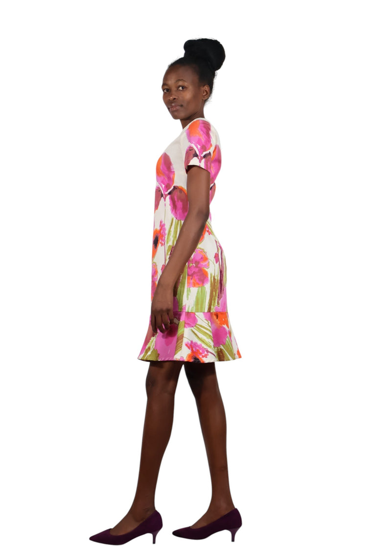 Off white floral round neck dress with a peplum