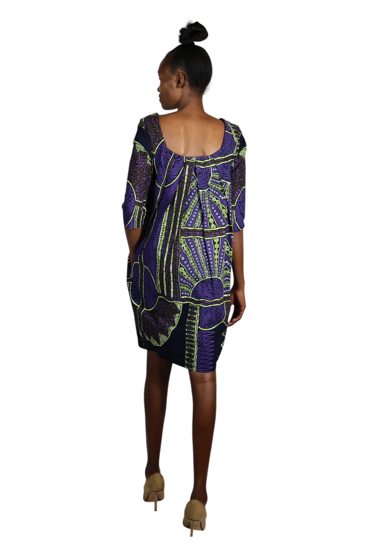 Pleated back dress with darts three quarter sleeves and square neckline