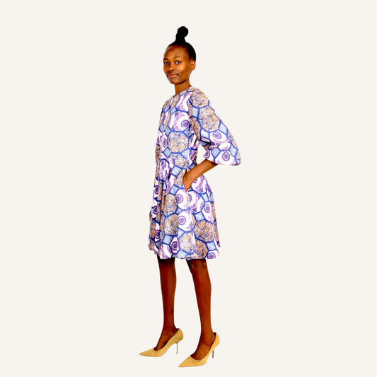 Printed mali dress with back opening,front zip elasticated balloon sleeves