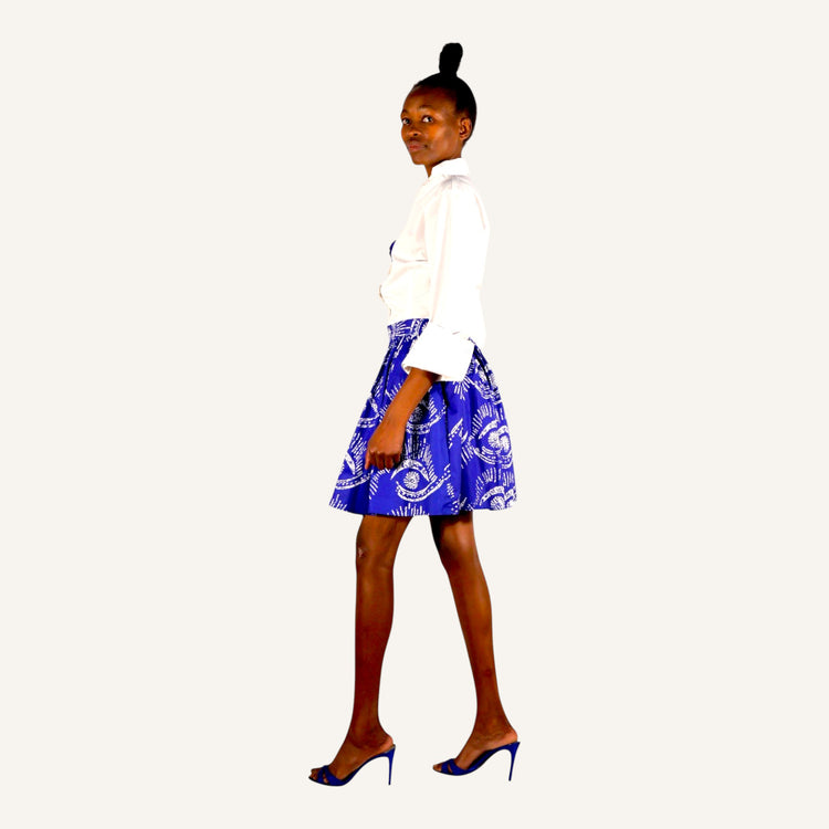 Blue eye print skirt with gathers, pockets and back zip