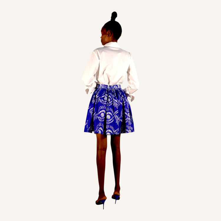 Blue eye print skirt with gathers, pockets and back zip