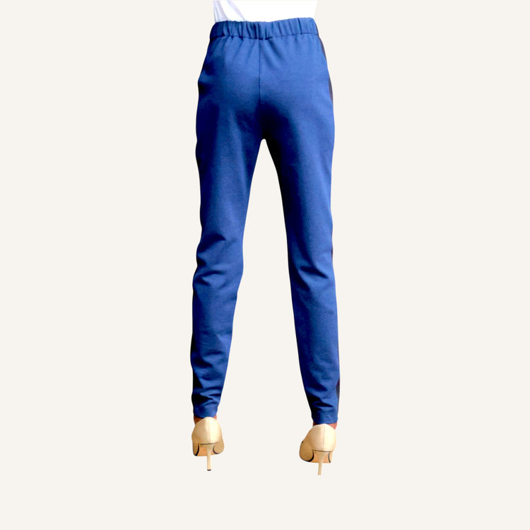 Skinny leg pin tuck pants with a strip and elastic band