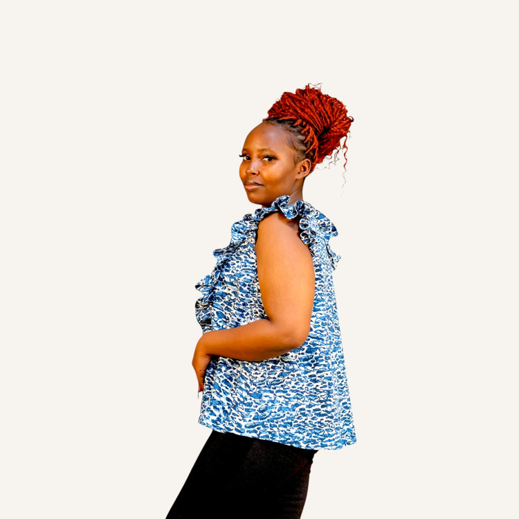 Blue print ruffled button down sleeveless top