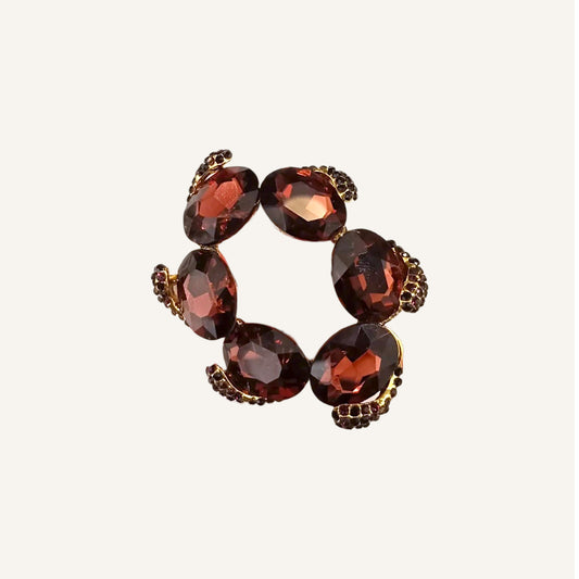 Brown and gold gemstone deco